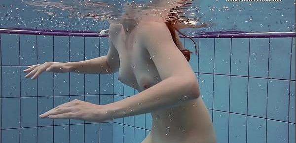  Pink swimswear babe Lera showing naked body underwater